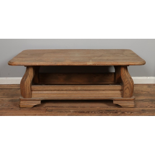 463 - A large oak coffee table with another mahogany example.

Oak coffee table measurements
Hx51cm
Wx135c... 