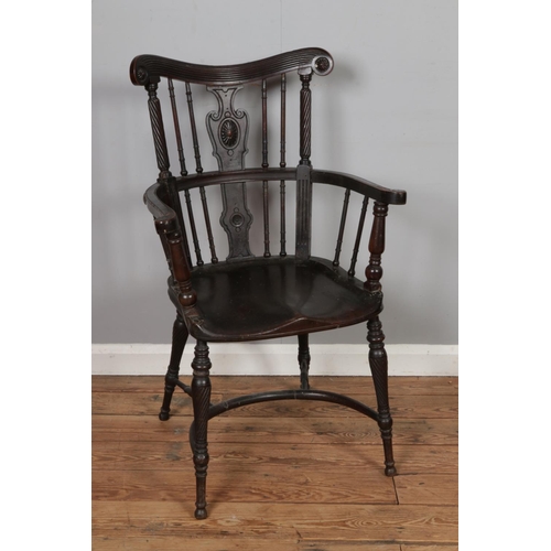 488 - An early Victorian dark stained oak and beech elbow chair with lyre shaped back splat, turned and sp... 