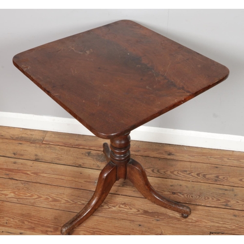 492 - An antique Victorian wooden tilt top table. Size: W58 x D59 x H72cm.