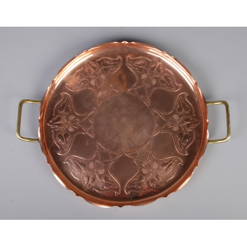 116 - A Joseph Sankey & Sons Art Nouveau designed copper tray, fluted edging and of circular form, marked ... 