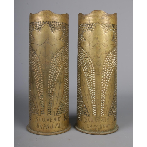 121 - A pair of first world war trench art artillery shell vases dated 1916 & 1917, one being engraved 'So... 