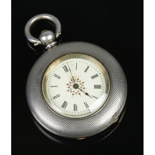 402 - A silver fob watch with engine turned case and monogram to back, stamped fine silver on the inside o... 