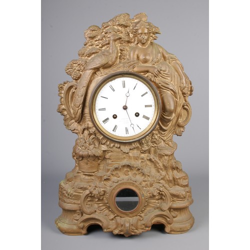 3 - A cast and gilt metal clock with a maiden and peacock design, stamped N Muller to front with enamel ... 