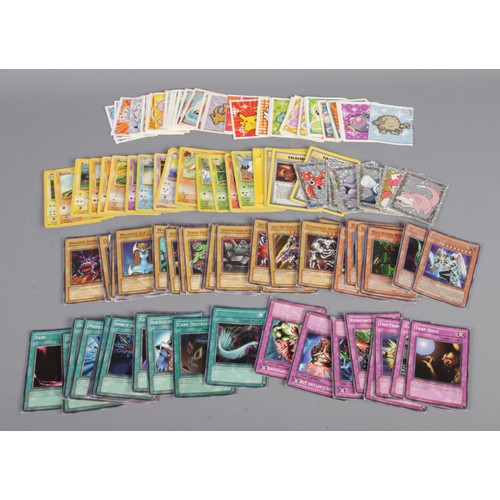 68 - A collection of Pokemon and YuGiOh trading cards, including Sinister Serpent, Valkyrion The Magna Wa... 