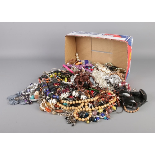 100 - A large box of costume jewellery including necklaces bracelets etc