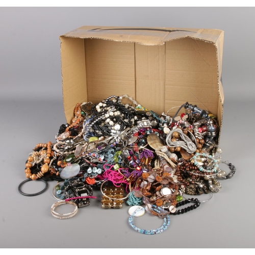 102 - A large box of costume jewellery including necklaces, bracelets, bangles etc