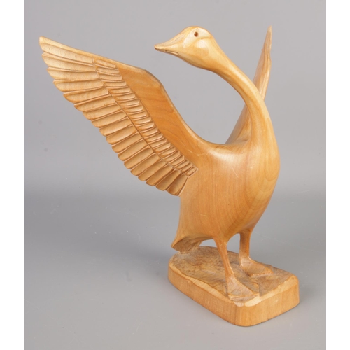 103 - A carved wooden figure of a goose by Mauno Veltheim, signed M Veltheim to the base, Mauno Veltheim w... 