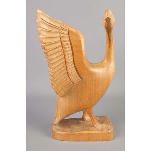 103 - A carved wooden figure of a goose by Mauno Veltheim, signed M Veltheim to the base, Mauno Veltheim w... 