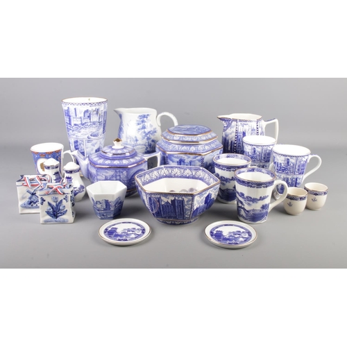 126 - A quantity of blue and white ceramics including Delft baskets, Ringtons, Spode etc