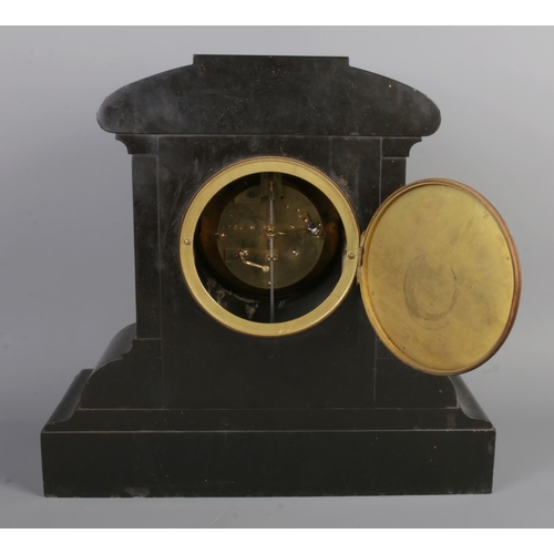 17 - A large antique French slate 8 Day mantel clock, with Roman numeral dial and visible escapement, pen... 