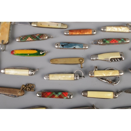 23 - A very large collection of folding pocket knives to include Richards 'Scottish Piper', Sheffield Mad... 