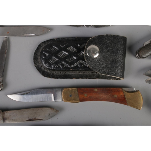 25 - A very large collection of folding pocket knives and multi-tools to include Rostfrei, Diamond Superi... 