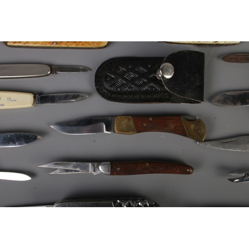 28 - A large collection of assorted folding knives and pocket tools to include Richards of Sheffield, Fon... 