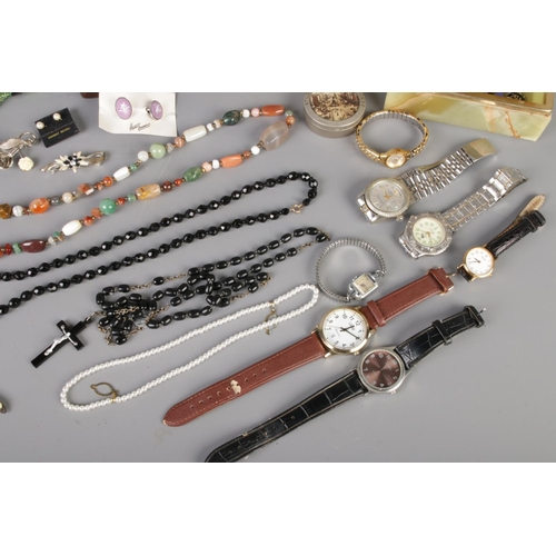 52 - A mixed collection of vintage costume jewellery, quartz watches and pen knives, including necklaces,... 