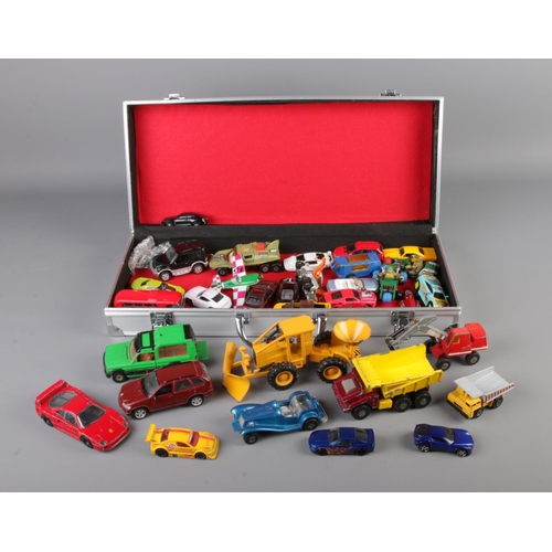 81 - A metal carry case of diecast vehicles including Matchbox, Corgi, Maisto, Lesney etc.