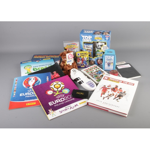 82 - A tray of football cards and stickers with other collectables including a Newcastle FC Pocket Calcul... 