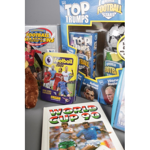 82 - A tray of football cards and stickers with other collectables including a Newcastle FC Pocket Calcul... 