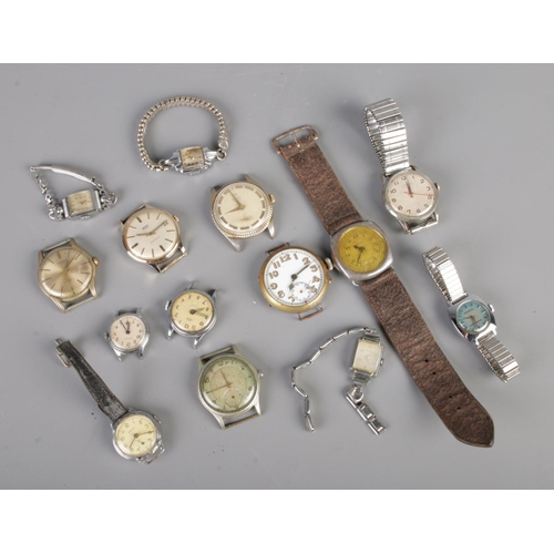 91 - A small box of Ladies & Gents wrist watches to include gents trench watch, two gents Smiths, lady's ... 