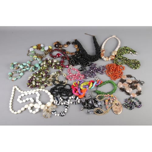 92 - A box of costume jewellery necklets.