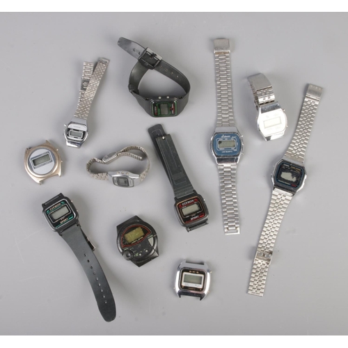 97 - An assorted tray of digital watches including Casio, Citron, Sanyo etc.