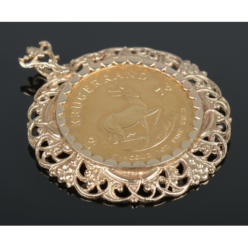 A South African 1oz gold full Krugerrand coin, dated 1976. In 9ct gold pendant mount. Total weight 46.07g.