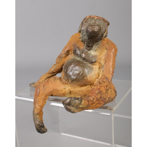 27 - John O'Connor (1967-) a small cold painted bronze sculpture modelled as a seated orangutan. Approxim... 