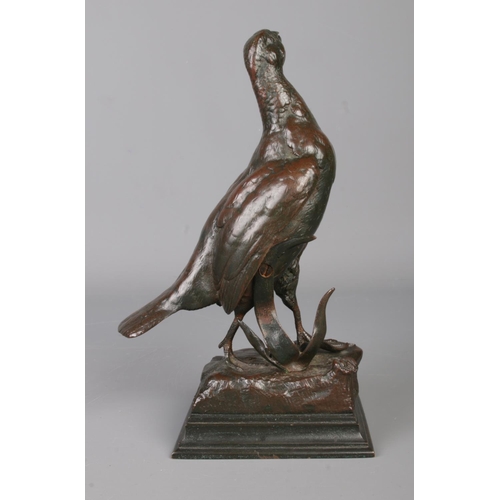 30 - Jules Moigniez (1835-1894), a bronze sculpture modelled as a grouse on naturalistic base. Signed. He... 