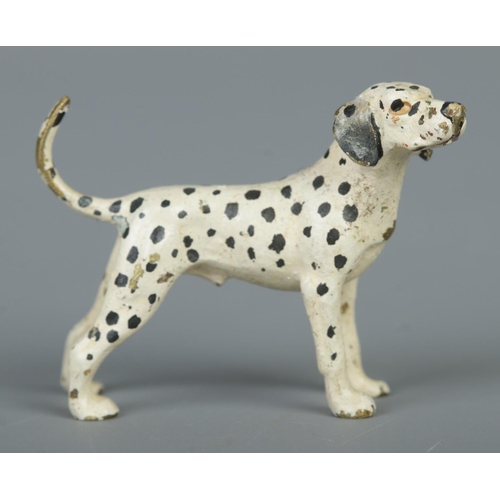 31 - A miniature cold painted bronze model of a Dalmatian dog. Stamped Austria to underside. Height 3.5cm... 