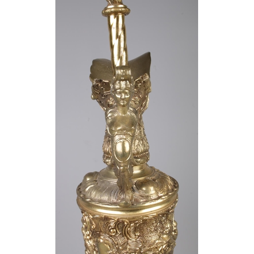 39 - A Renaissance style gilt metal ewer lamp raised on circular marble base. With figural Height 74cm.