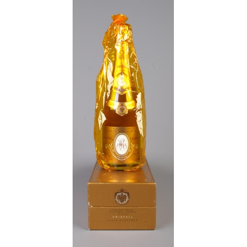 52 - A boxed 750ml bottle of Louis Roederer Cristal Champagne Brut, 1993.