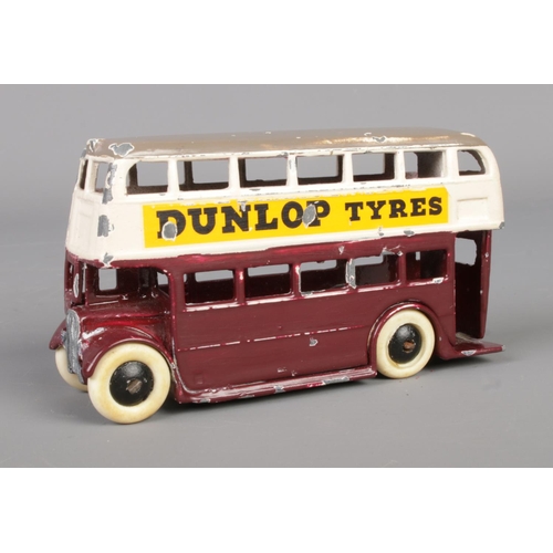 63 - A Dinky Meccano diecast model double decker bus, 29C, advertising Dunlop Tyres. Length 10cm.