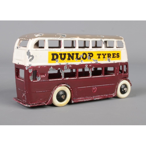 63 - A Dinky Meccano diecast model double decker bus, 29C, advertising Dunlop Tyres. Length 10cm.