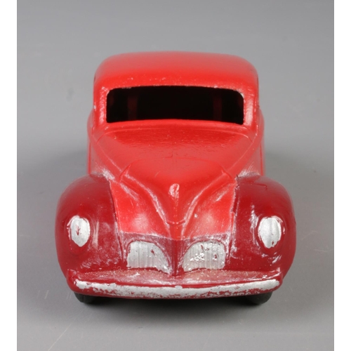 64 - A vintage Dinky Toys Lincoln Zephyr 39C. Red with maroon wings. Length 10.5cm.