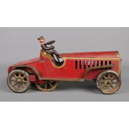 65 - A vintage Schieble hill climber friction powered model car. Length 30cm.