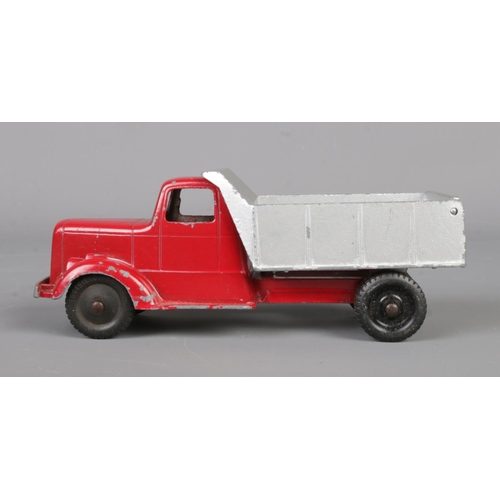 66 - A vintage American TootsieToy dump truck. Length 14cm.