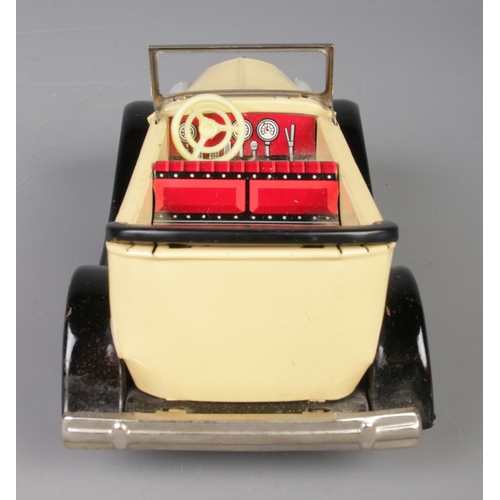 71 - A vintage Paya tin plate mechanical taxi along with a boxed Japanese tin plate Ford-A Touring Conver... 