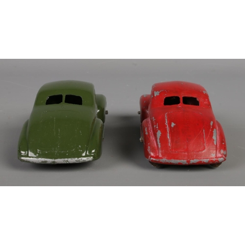 80 - Two Dinky Meccano diecast model cars, Studebaker 39F, green and red paint. Length 10.5cm.