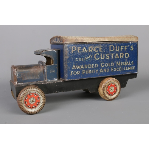 81 - A vintage Pearce Duff Custard/Blanc Mange advertising tin modelled as a delivery lorry. Length 32cm.