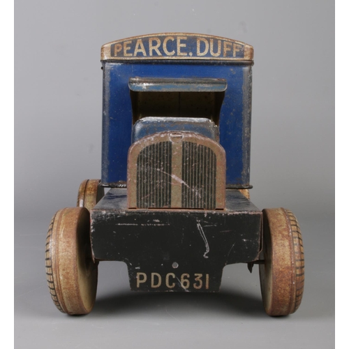 81 - A vintage Pearce Duff Custard/Blanc Mange advertising tin modelled as a delivery lorry. Length 32cm.