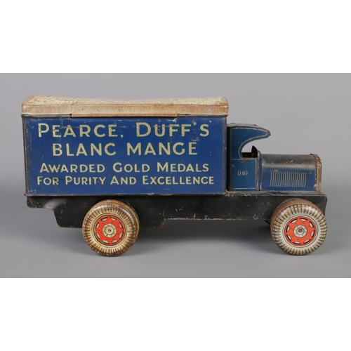 81 - A vintage Pearce Duff Custard/Blanc Mange advertising tin modelled as a delivery lorry. Length 32cm.