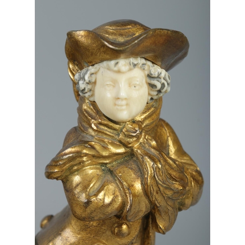 29 - An early 20th century French gilt bronze and ivory (chryselephantine) figure modelled as a skating c... 