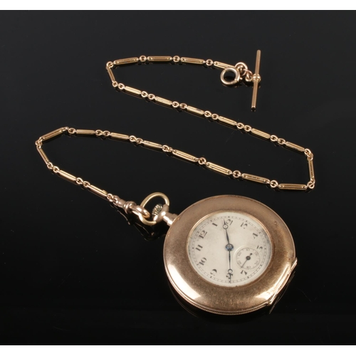 477 - A 9ct gold Swiss made pocket watch with 9ct gold albert chain. Case diameter 45mm.

Chain 9.4g
Watch... 