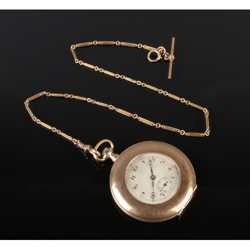 477 - A 9ct gold Swiss made pocket watch with 9ct gold albert chain. Case diameter 45mm.

Chain 9.4g
Watch... 