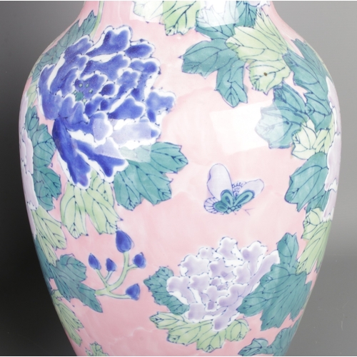 289 - A pair of large vintage blue & pink oriental vases, with delicate botanical painting, height 46cm.