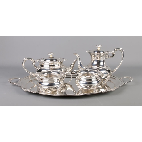 264 - A silver plate tea service on tray produced by Cooper Bro's consisting of tea pot, coffee pot, jug a... 