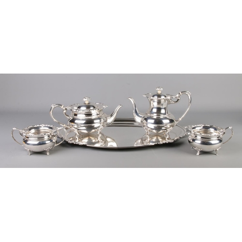 264 - A silver plate tea service on tray produced by Cooper Bro's consisting of tea pot, coffee pot, jug a... 