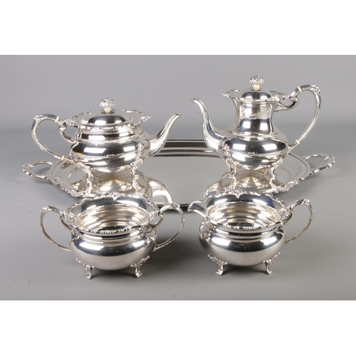 264 - A silver plate tea service on tray produced by Cooper Bro's consisting of tea pot, coffee pot, jug a... 