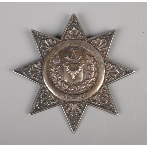 475 - A Victorian silver Ancient Order of Foresters sash badge, having foliage and wreath relief design wi... 