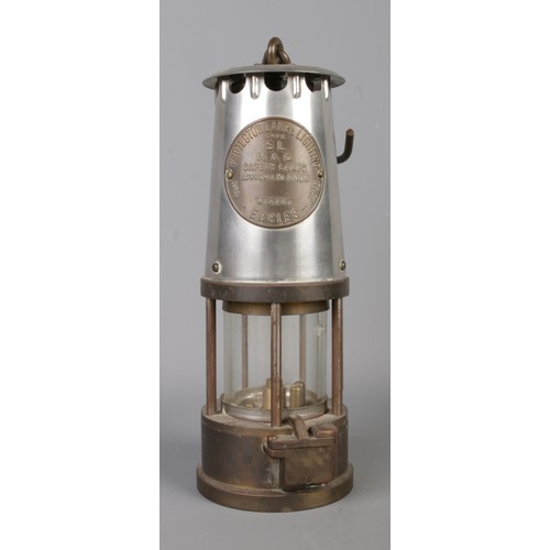 262 - An Eccles Type SL M&Q miner's safety lamp, by The Protector Lamp and Lighting Co Ltd.