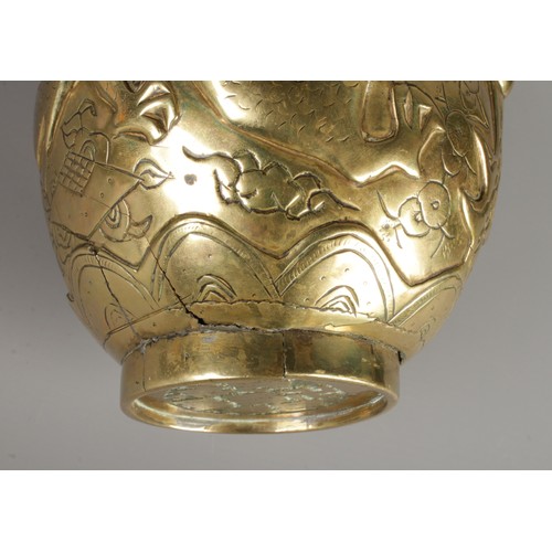 266 - A pair of early Twentieth Century Chinese polished brass vases decorated with coiled dragons. Bearin... 